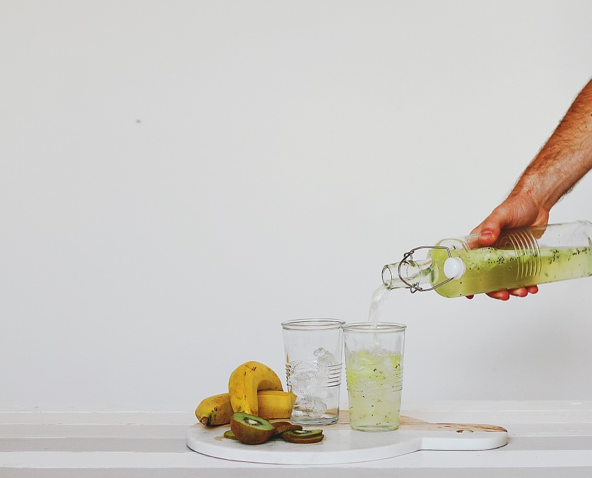 pouring water to glasses
